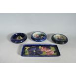 COLLECTION OF FOUR MOORCROFT DISHES