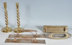 COLLECTION OF 20TH CENTURY BRASSWARE TO INCLUDE CANDLESTICKS AND DOOR HANDLES.