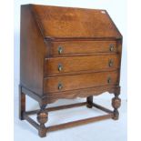 1920'S JACOBEAN REVIVAL OAK BUREAU DESK