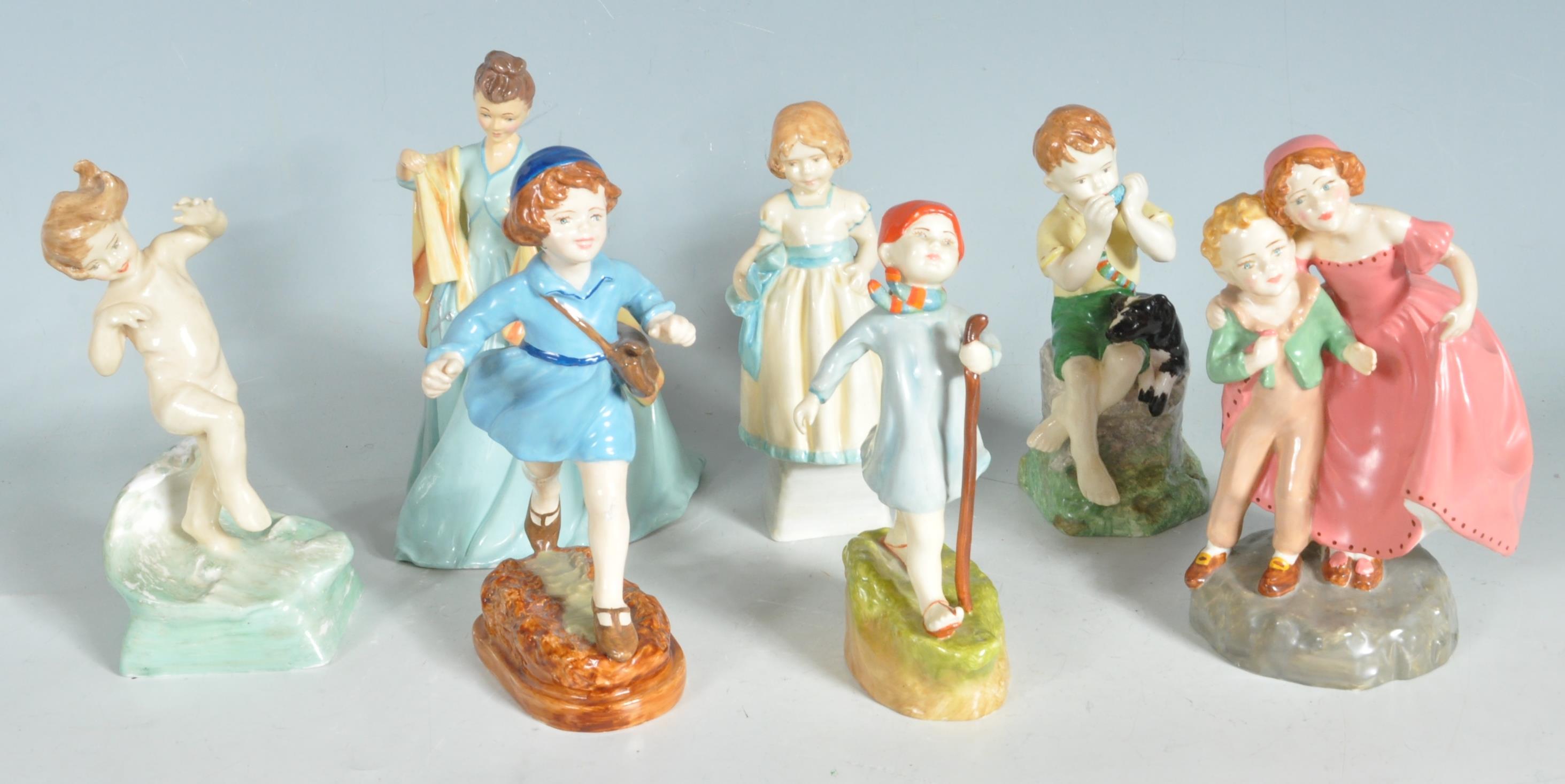 GROUP OF UNMARKED CERAMIC FIGURINES