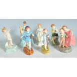 GROUP OF UNMARKED CERAMIC FIGURINES