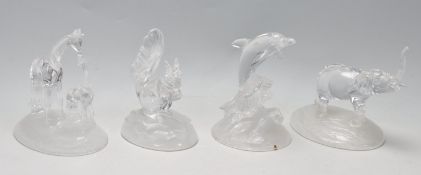 FOUR CRYSTAL FIGURINES BY D’ARQUES