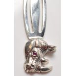 STAMPED STERLING SILVER RHINO BOOK MARK.