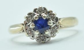 9CT GOLD 375 RING WITH BLUE AND WHITE STONES