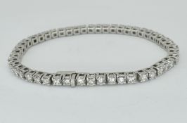 FRENCH 18CT WHITE GOLD & DIAMOND TENNIS BRACELET