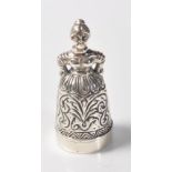 STAMPED 925 SILVER THIMBLE AND PIN CUSHION IN THE FORM OF A LADY.