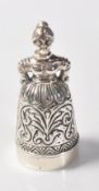 STAMPED 925 SILVER THIMBLE AND PIN CUSHION IN THE FORM OF A LADY.