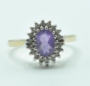 9CT GOLD PURPLE STONE AND DIAMOND RING