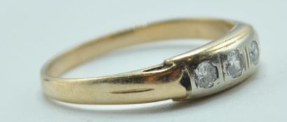 18CT GOLD AND DIAMOND THREE STONE RING