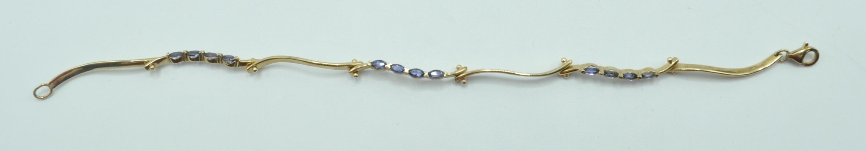 9CT GOLD AND BLUE STONE SPACER BRACELET