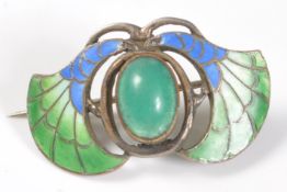 ANTIQUE ART NOUVEAU GREEN STONE AND ENAMEL BROOCH