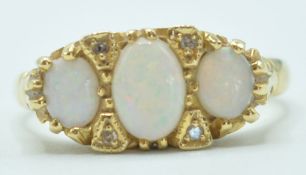 18CT GOLD OPAL AND DIAMOND RING