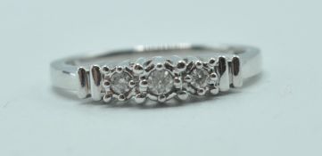 9CT WHITE GOLD AND DIAMOND THREE STONE RING