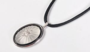 18CT WHITE GOLD ROCK CRYSTAL, ONYX AND DIAMOND PENDANT