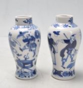 TWO CHINESE ORIENTAL BLUE AND WHITE CERAMIC VASES