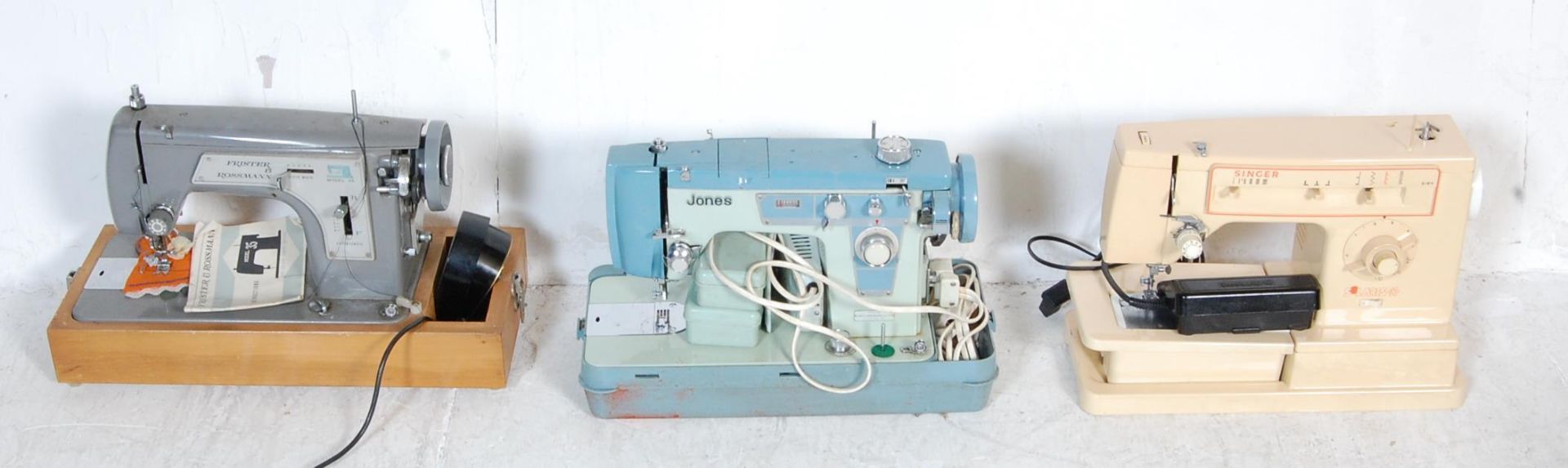 THREE VINTAGE ELECTRONIC SEWING MACHINES