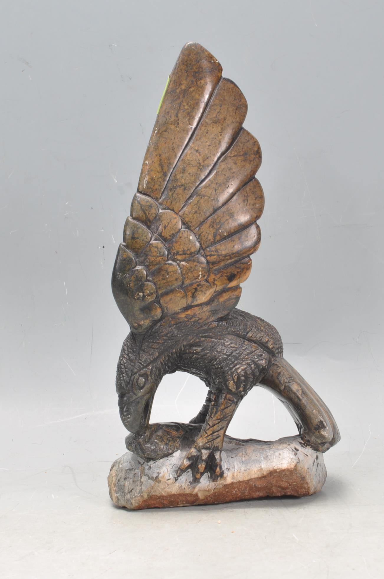 20TH CENTURY CARVED HARDSTONE FIGURE OF A BIRD OF PREY. - Image 4 of 7