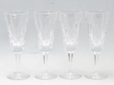 SET OF FOUR LISMORE PATTERN WATERFORD CRYSTAL CHAMPAGNE FLUTE GLASSES