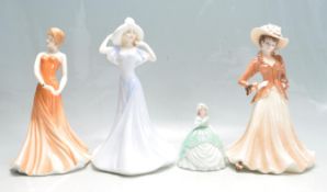 COLLECTION OF FOUR CERAMIC FIGURINES