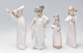 GROUP OF FOUR SPANISH CERAMIC PORCELAIN FIGURINES