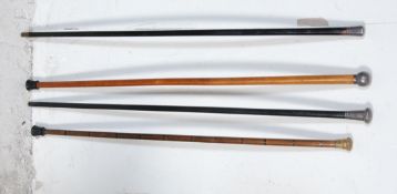 GROUP OF FOUR 20TH CENTURY WALKING STICKS