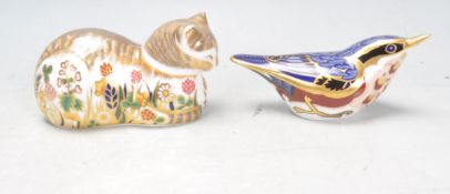 TWO ROYAL CROWN DERBY PAPERWEIGHTS