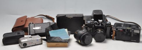 COLLECTION OF 20TH CENTURY 35MM CAMERAS AND FOLDING CAMERAS