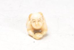 ANTIQUE JAPANESE IVORY NETSUKE OF BABY