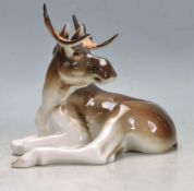 FOUR CERAMIC RUSSIAN ANIMAL FIGURINES AND OTHERS