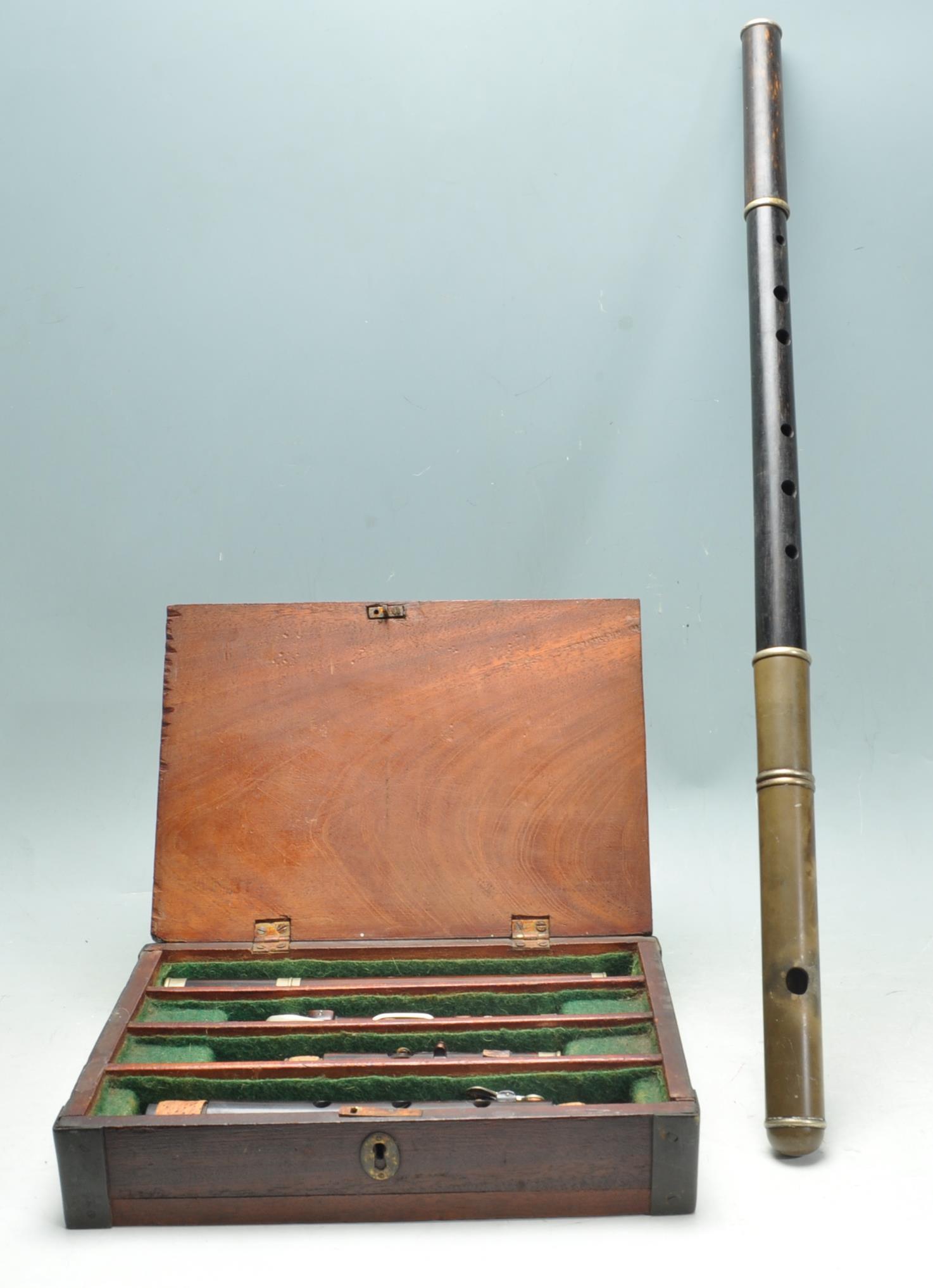 EARLY 20TH CENTURY BOXED CLARINET AND FIFE FLUTE.