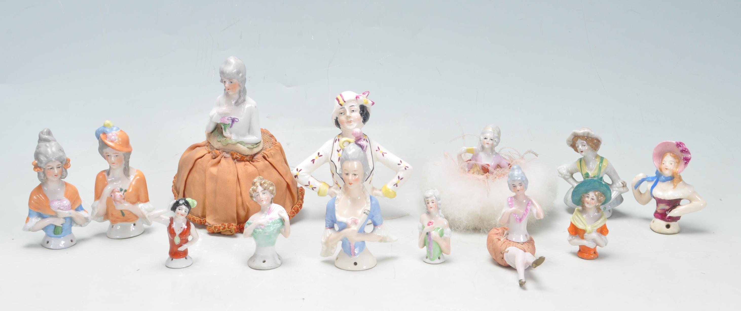 COLLECTION OF 28 PIN CUSHION HALF DOLLS