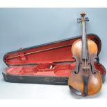 19TH CENTURY MAPLE AND SRUCE VIOLIN WITH HANDWRITTEN LABEL TO THE INSIDE.