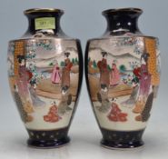 PAIR OF EARLY 20TH CENTURY JAPANESE VASES WITH COBALT AND GILT GROUND.