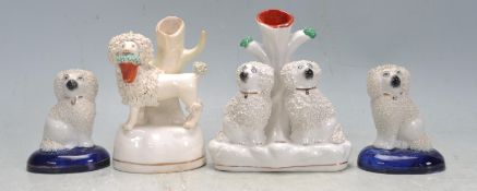 COLLECTION OF FOUR 19TH CENTURY / 20TH CENTURY STAFFORDSHIRE CERAMIC POODLE FIGURINES