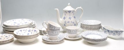 GROUP OF BLUE AND WHITE CERAMIC PORCELAIN DINNER AND TEA SET WARE