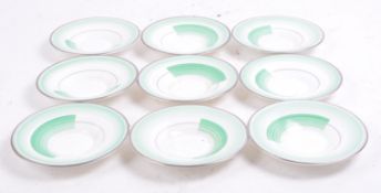 SET OF NINE SHELLEY CHINA REGENT SHAPE SAUCERS.