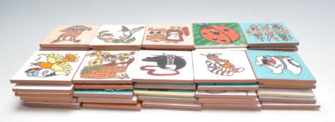 LARGE COLLECTION OF VINTAGE 20TH CENTURY POLYCHROME TILES.