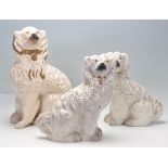 THREE 19TH CENTURY VICTORIAN STAFFORDSHIRE SPANIEL DOGS