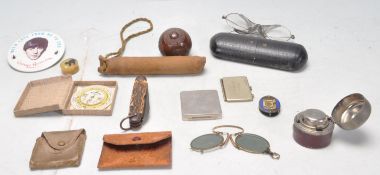 COLLECTION OF MISCELLANEOUS CURIOS TO INCLUDE A MEDAL, INKWELL AND A MONOCULAR.