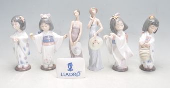 COLLECTION OF SEVEN LLADRO FIGURINES