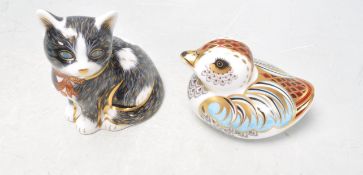 TWO ROYAL CROWN DERBY PAPERWEIGHTS