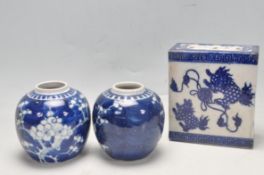 ANTIQUE CHINESE BLUE AND WHITE FLOWER BRICK AND TWO GINGER JARS