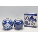 ANTIQUE CHINESE BLUE AND WHITE FLOWER BRICK AND TWO GINGER JARS