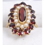 18CT GOLD SEED PEARL AND GARNET RING