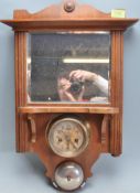 CIRCA 1920'S - 1930'S BEVELLED WALL HANGING MIRROR WITH GERMAN ALARM CLOCK