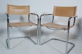 TWO VINTAGE CANTILEVER DINIG CHAIRS