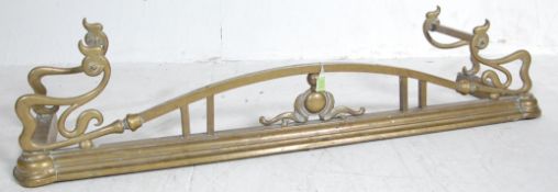 20TH CENTURY ART NOUVEAU STYLE BRASS FIRE FENDER