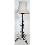 A VINTAGE 20TH CENTURY CAST METAL STANDARD LAMP