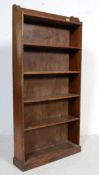 1920’S OAK OPEN WINDOW BOOKCASE IN THE MANNER OF LIBERTY