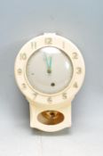 VINTAGE 20TH CENTURY CREAM BAKELITE WALL MOUNTED CLOCK